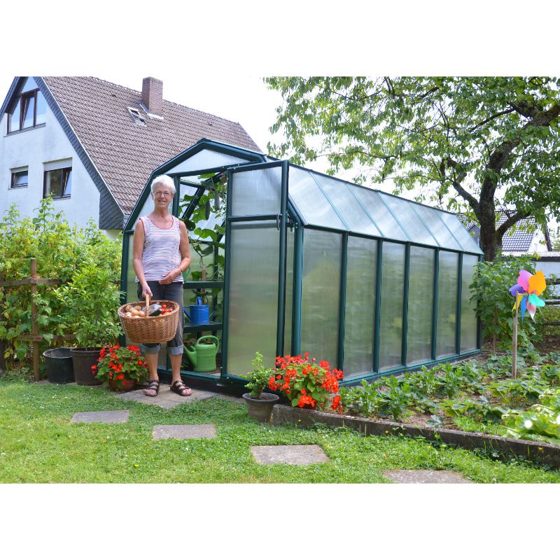 ecogrow-greenhouse-woman-standing-in-front