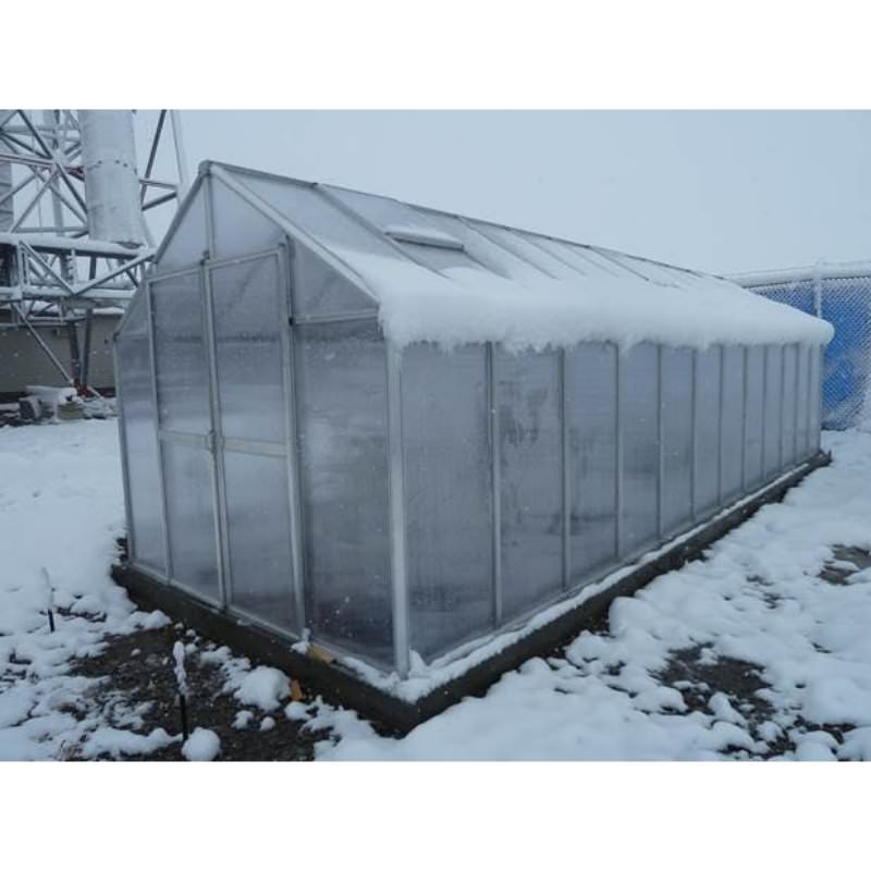 mont-greenhouse-holding-up-underneath-snow