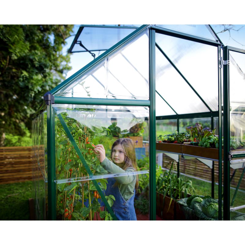 palram-canopia-hybrid-6x10-greenhouse-girl-picking-a-pepper