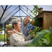 palram-victory-orangery-man-and-woman-smiling-at-eachother