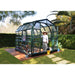 prestige-greenhouse-woman-standing-in-front