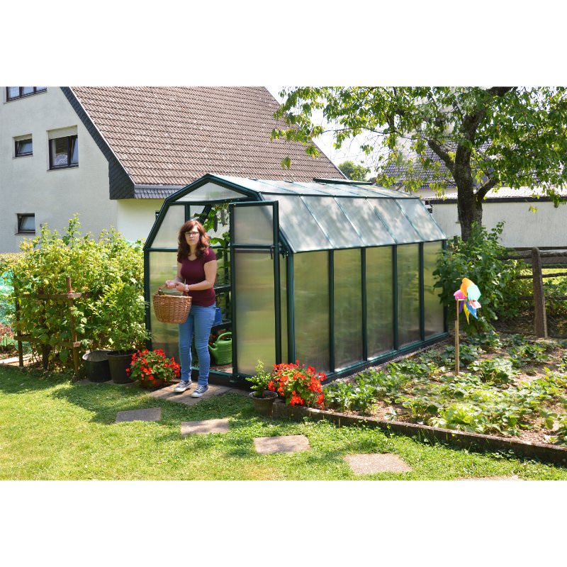 rion-ecogrow-greenhouse-woman-holding-basket-in-front